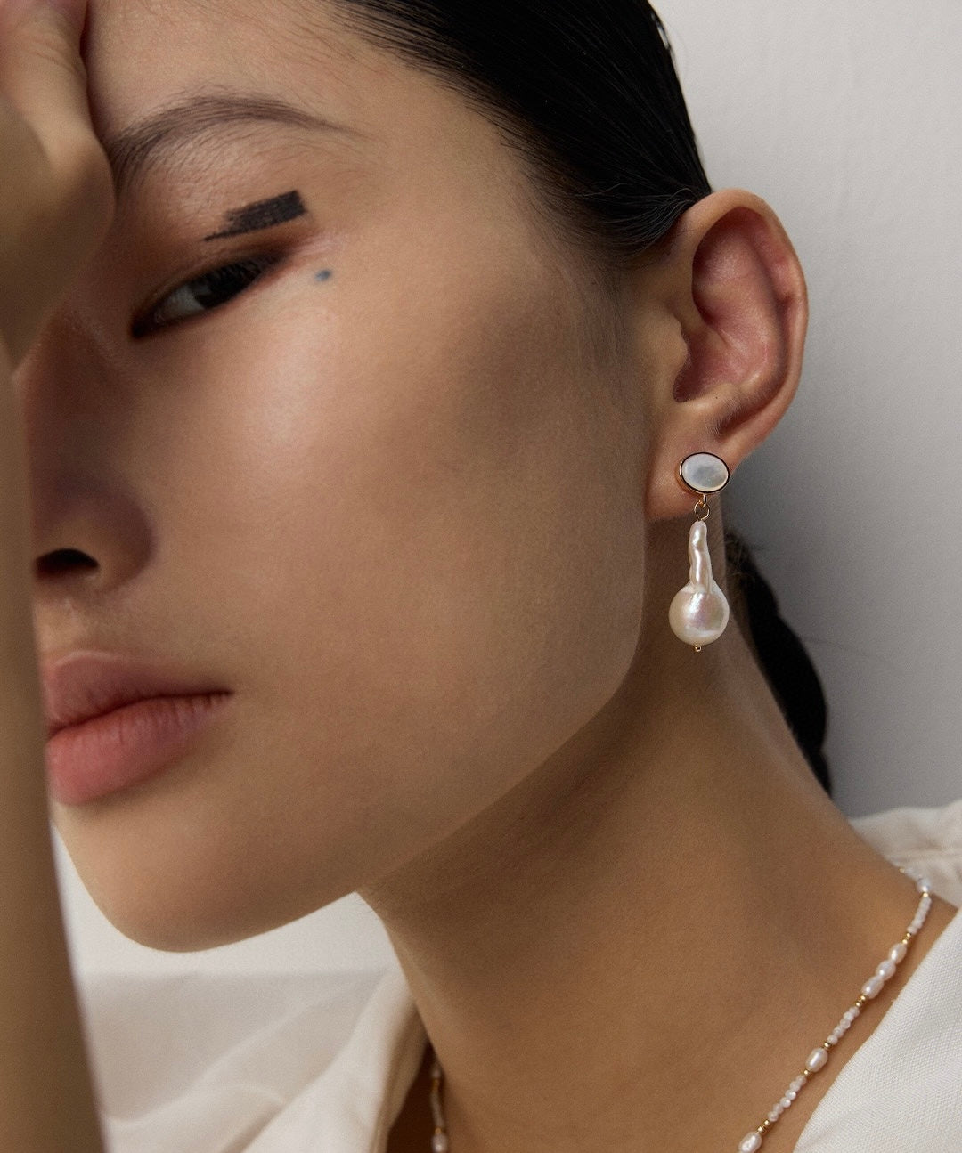 Big baroque pearl earrings