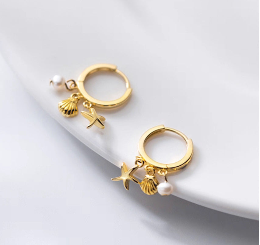 Dainty sterling silver starfish hoops