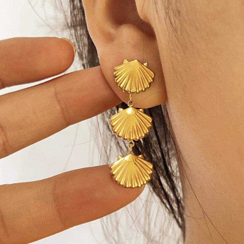 Three shell earrings
