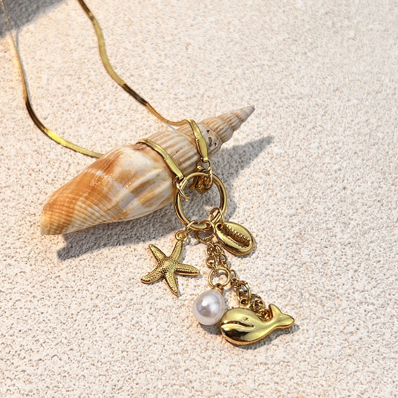 Dolphin charm necklace