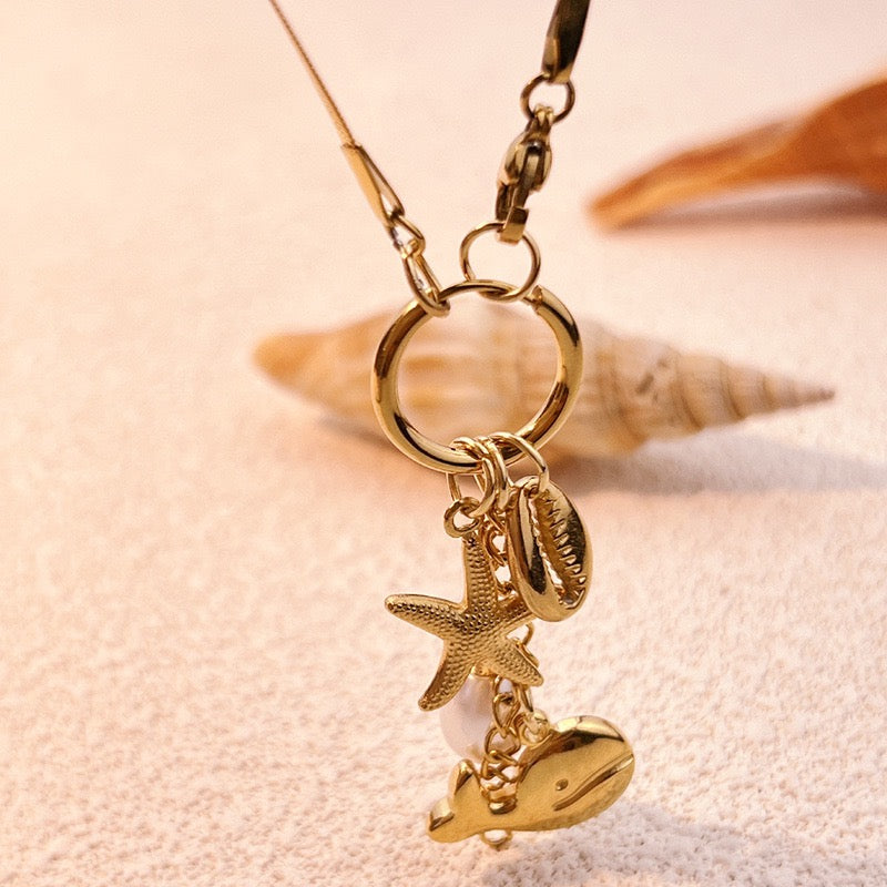 Dolphin charm necklace