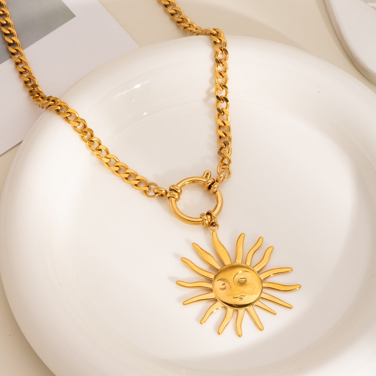 Smiling sun necklace