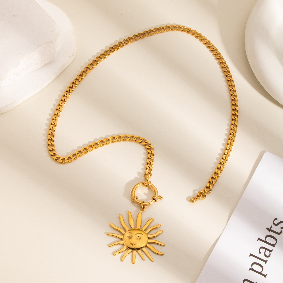 Smiling sun necklace