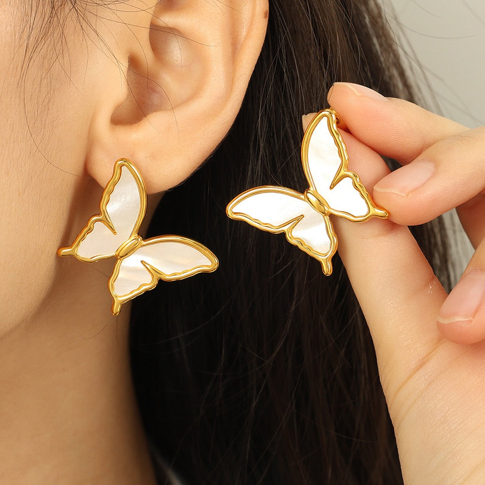 White butterfly earrings