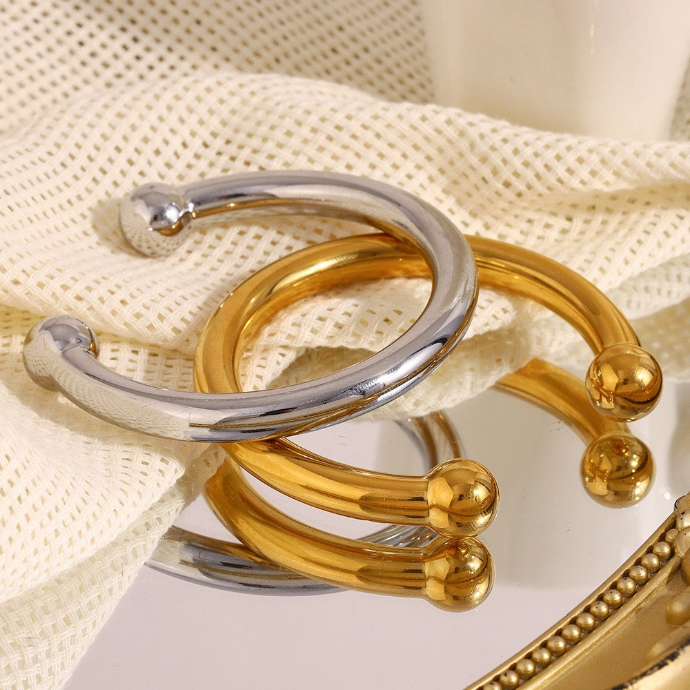 Gold beady statement bangle