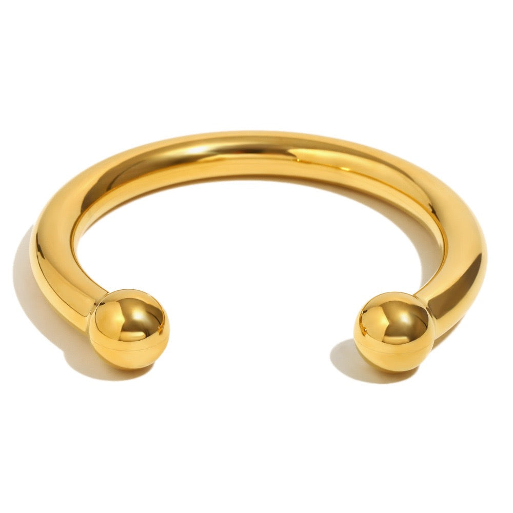 Gold beady statement bangle