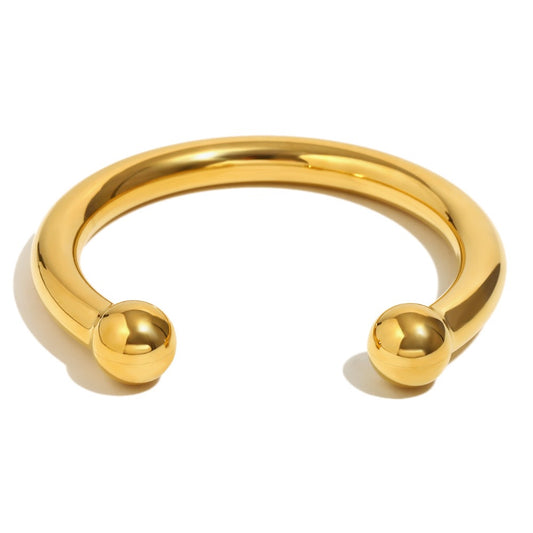 Gold beady statement bangle