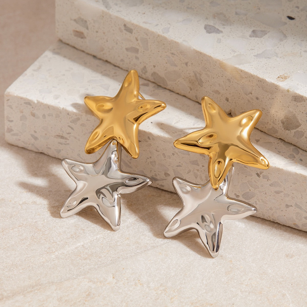 Two tones stars earrings