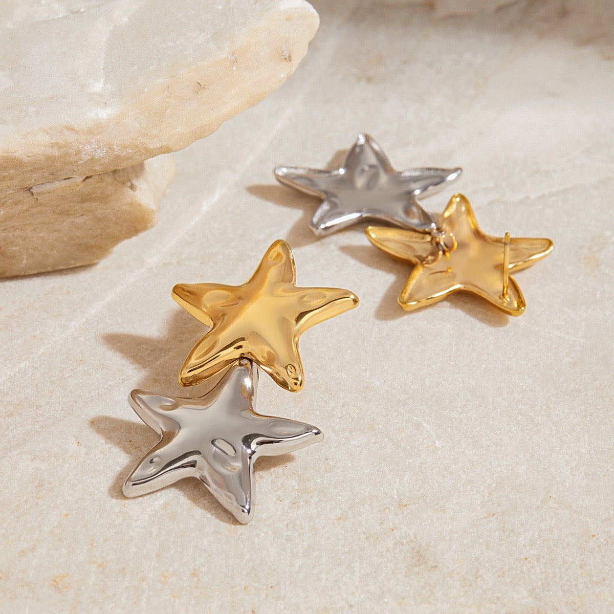 Two tones stars earrings