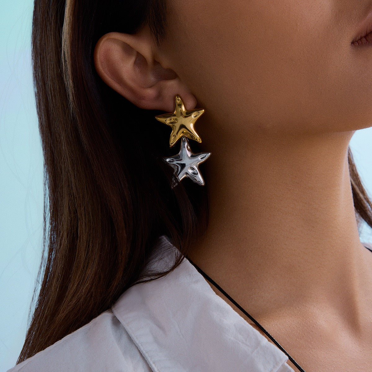 Two tones stars earrings