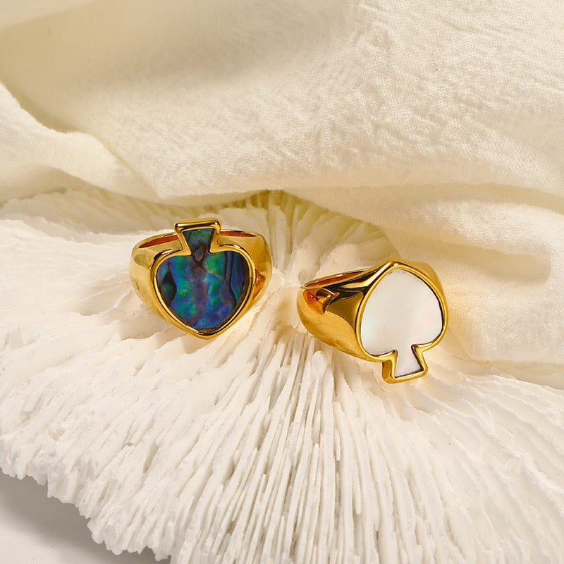 Poker face heart ring