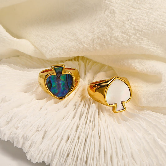 Poker face heart ring