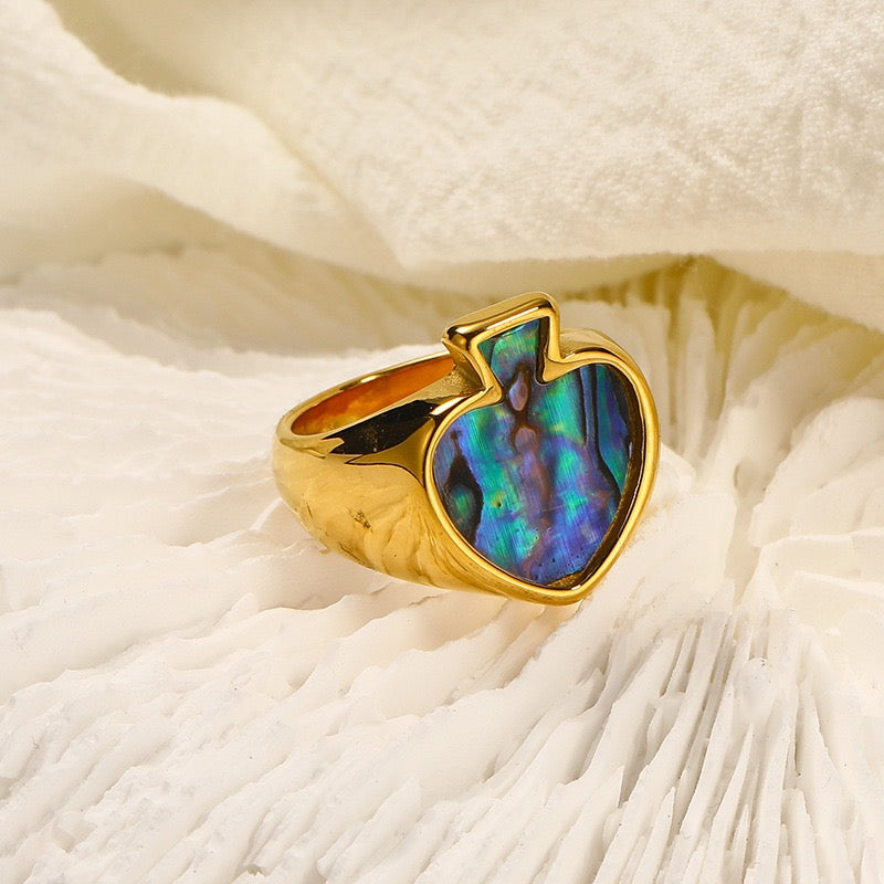 Poker face heart ring