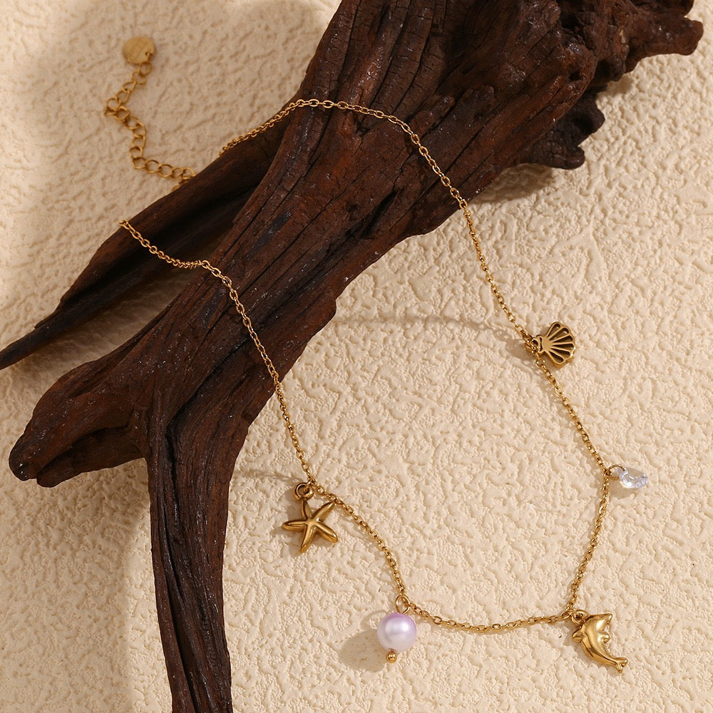 Dolphin charm necklace