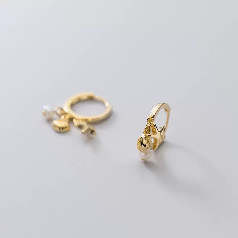Dainty sterling silver starfish hoops