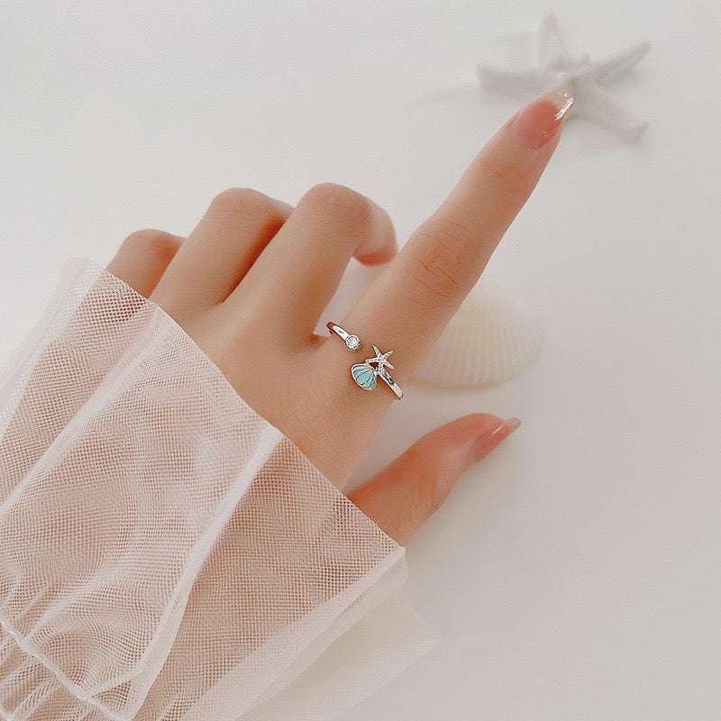 Dainty blue starfish ring