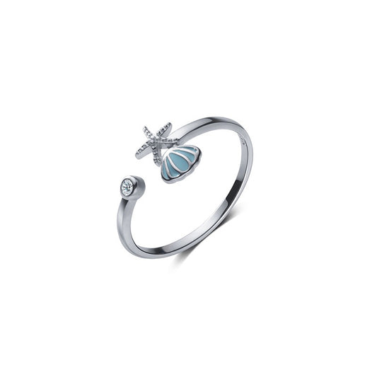 Dainty blue starfish ring