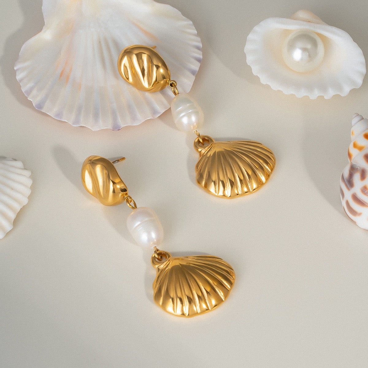 Golden shell pearl earrings