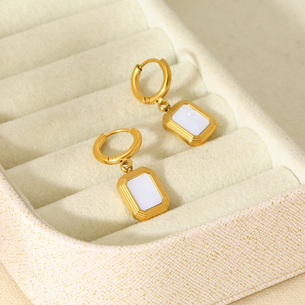 White sand hoop earrings