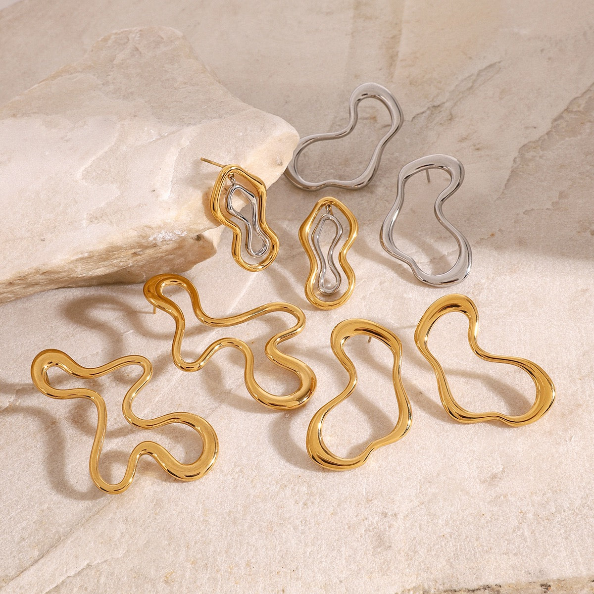 Melting lines earrings