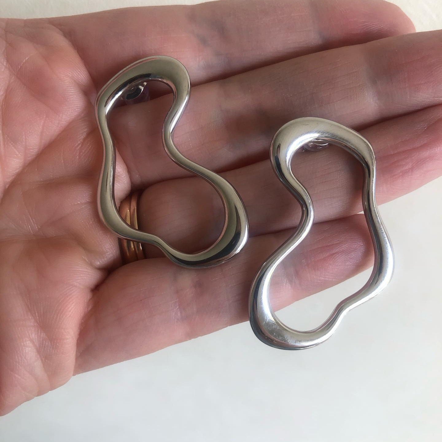 Melting lines earrings