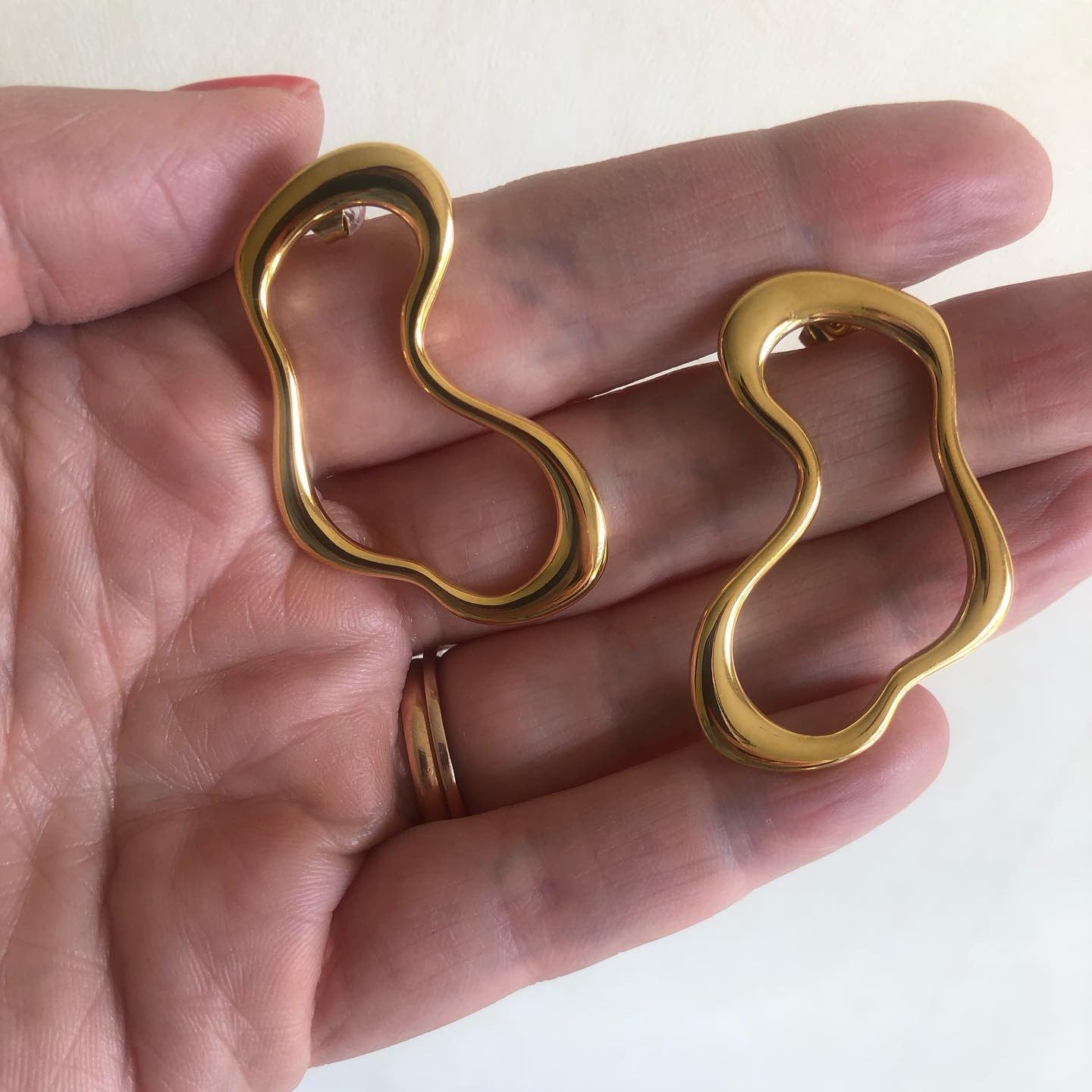 Melting lines earrings