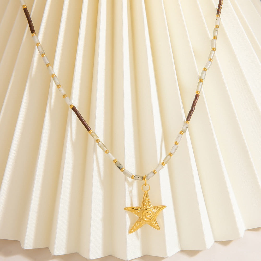 Swirl star necklace