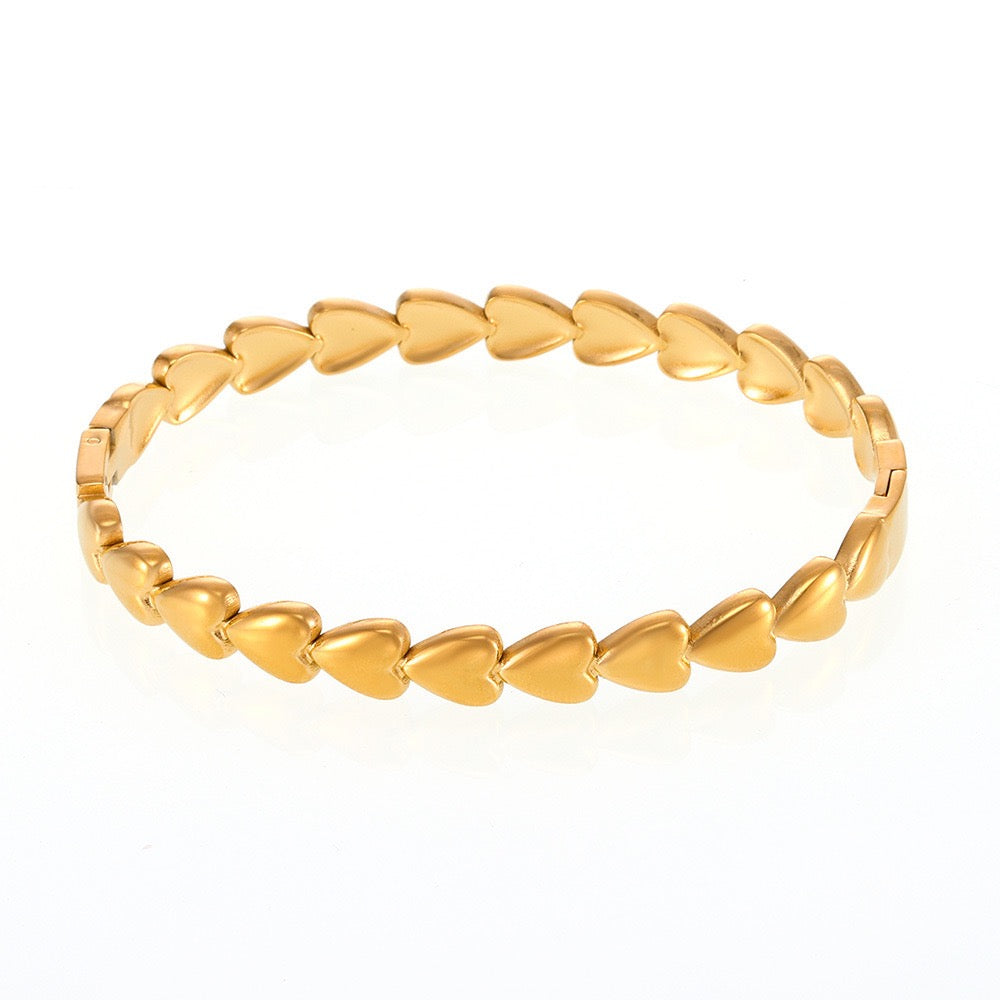 Gold heart bangle