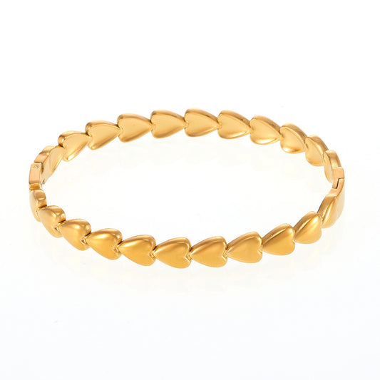 Gold heart bangle