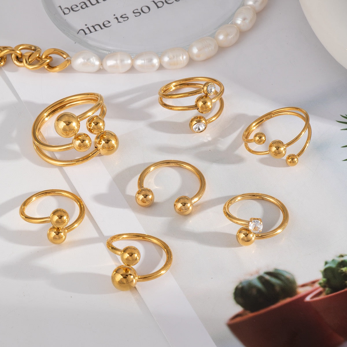 Jess Gold balls rings