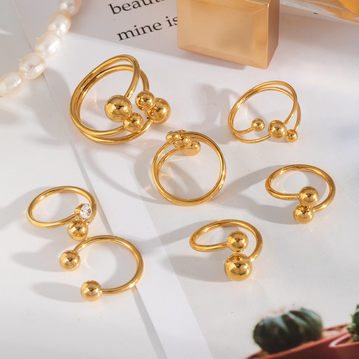 Jess Gold balls rings