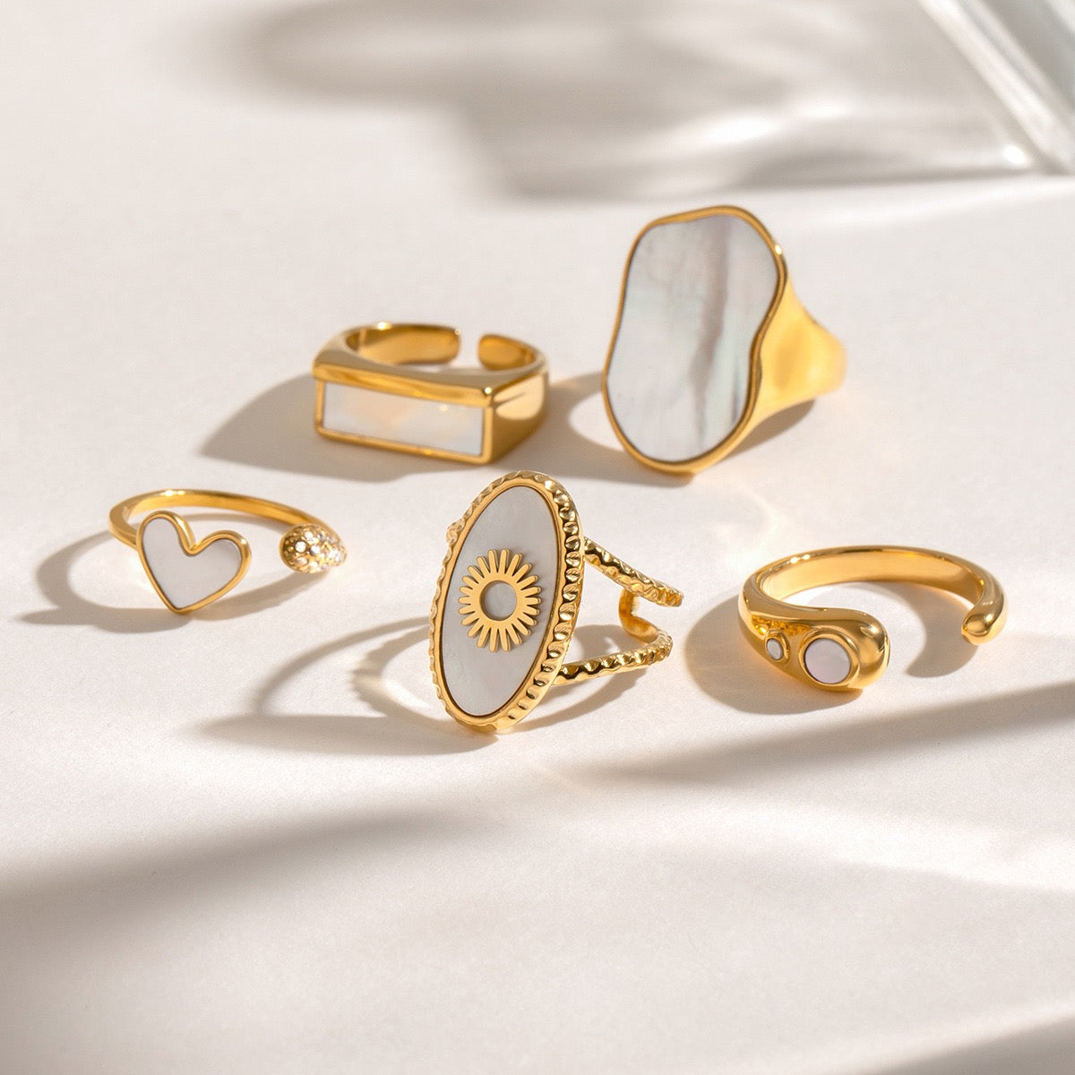 Estes White mother of pearl rings