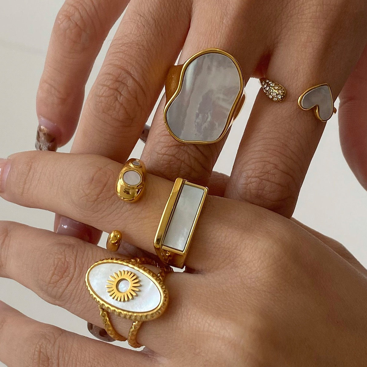 Watts Big mother of pearl rings