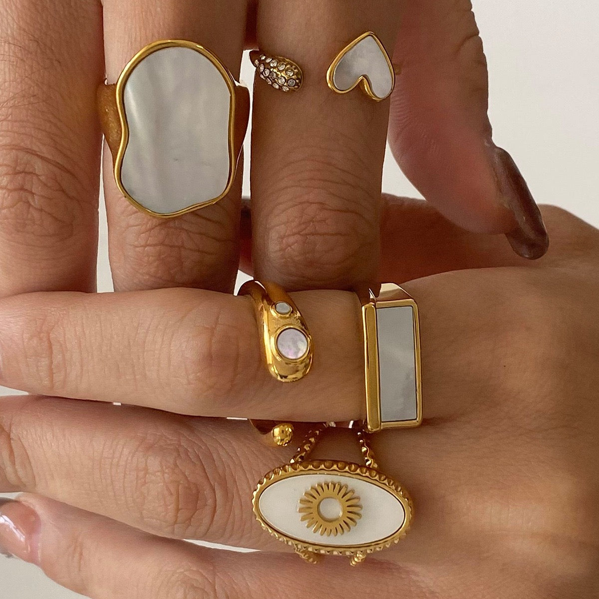 Watts Big mother of pearl rings