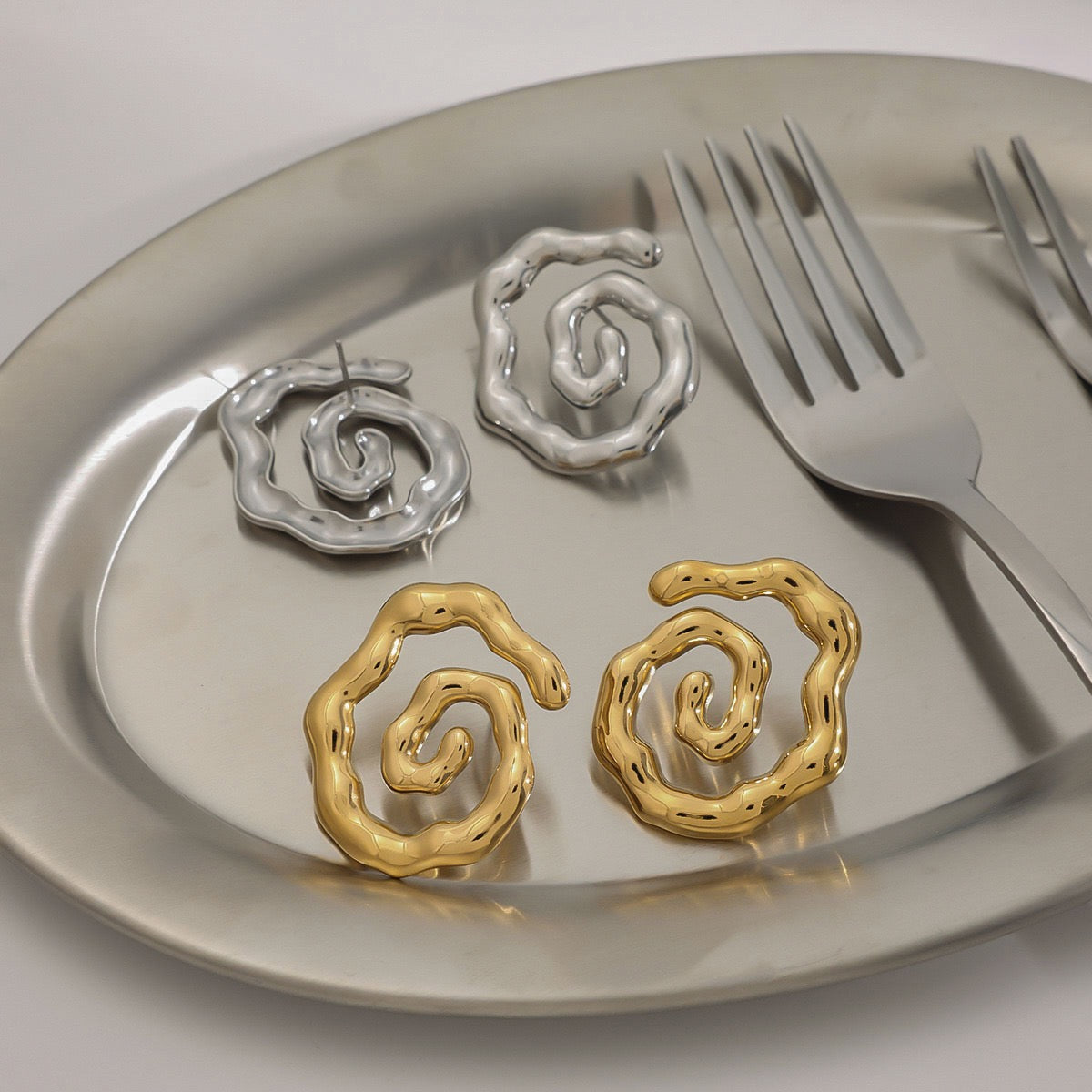 Melting swirl earrings