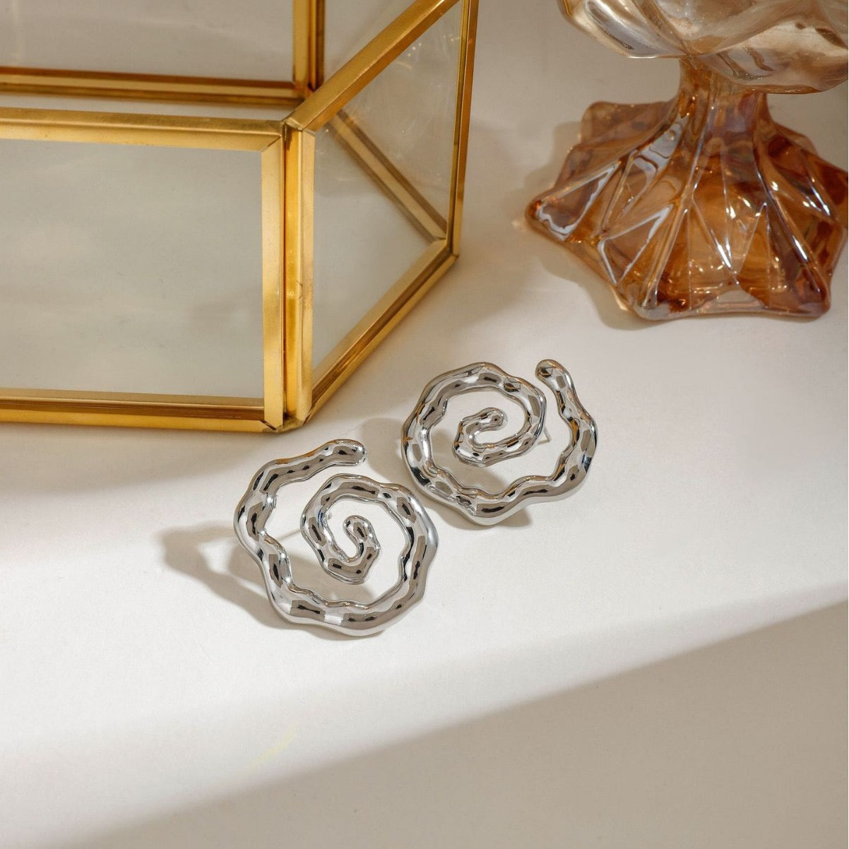 Melting swirl earrings