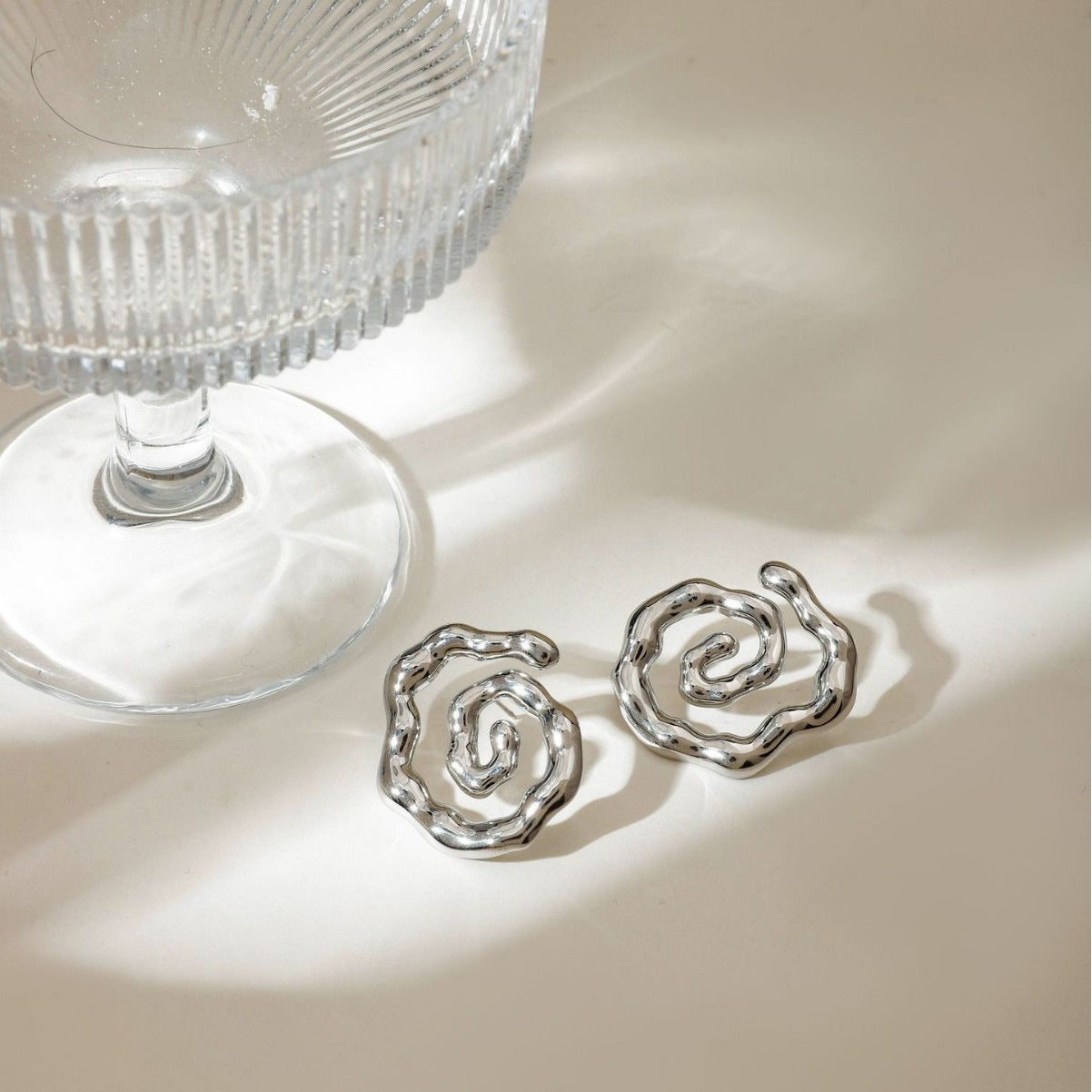 Melting swirl earrings