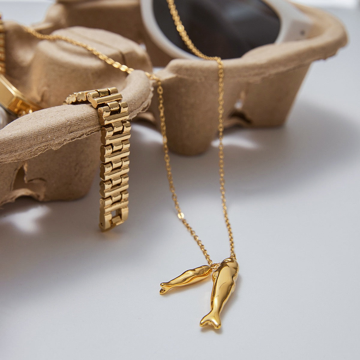 Double fish necklace