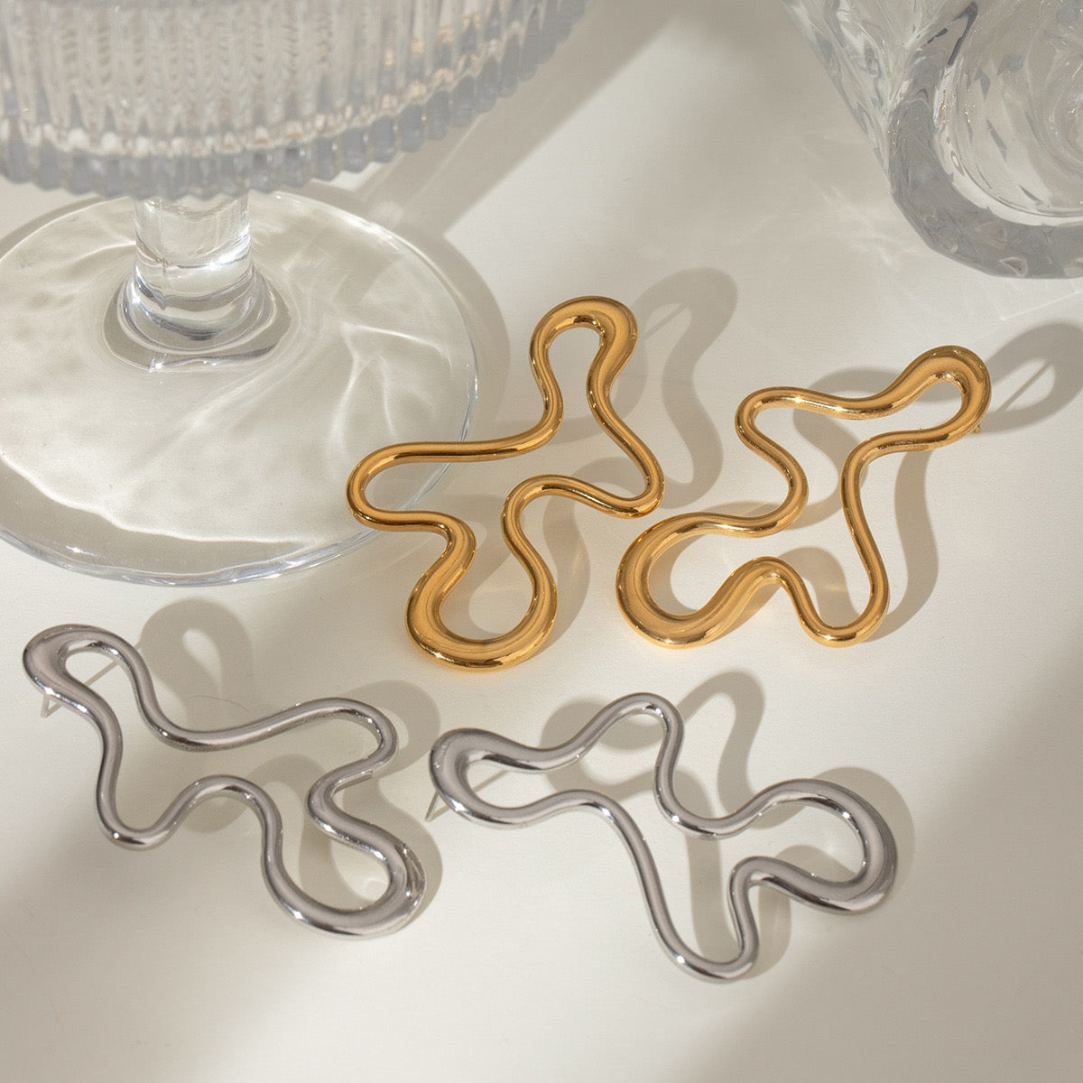 Melting lines earrings