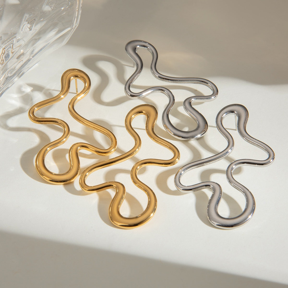 Melting lines earrings