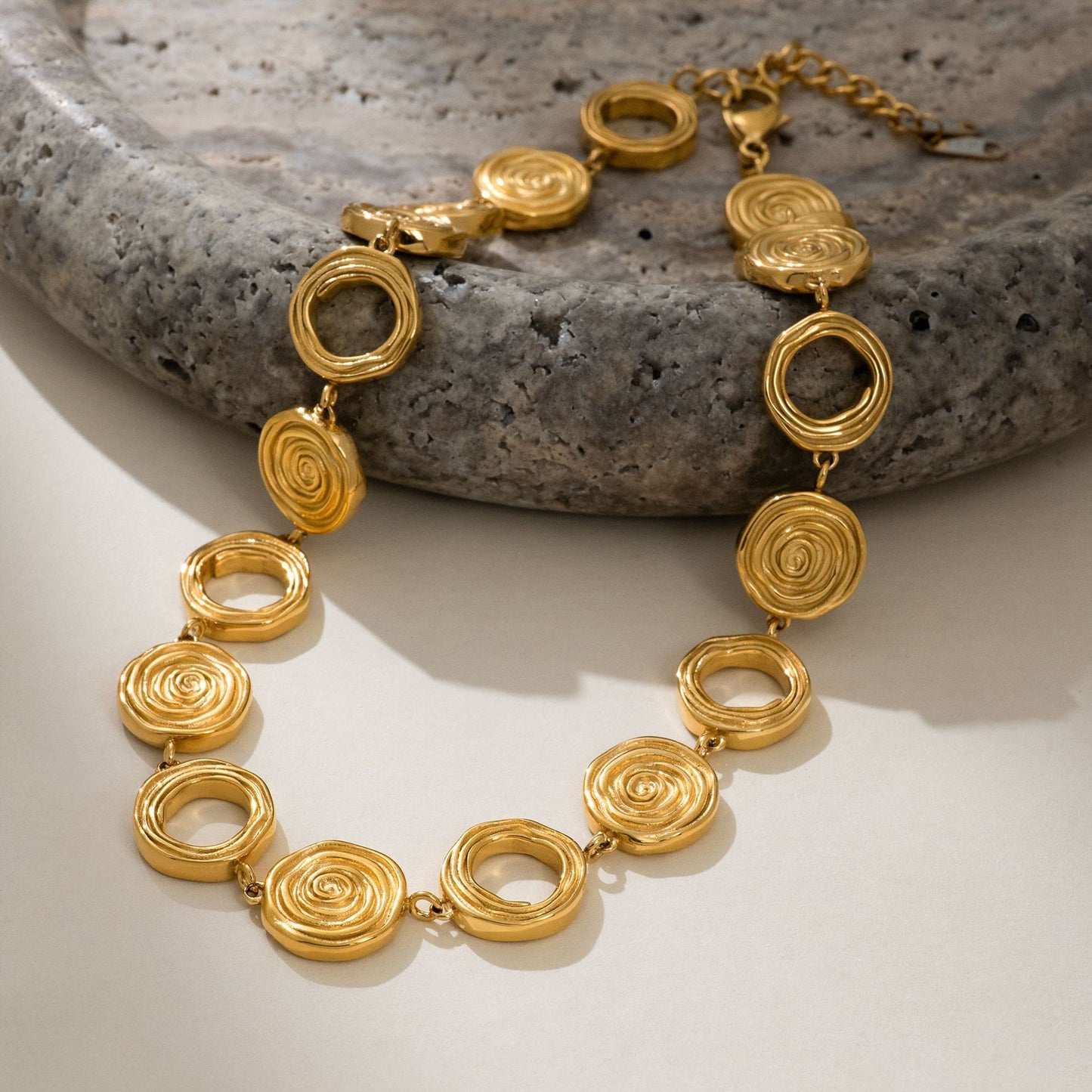 Swirl cross necklace