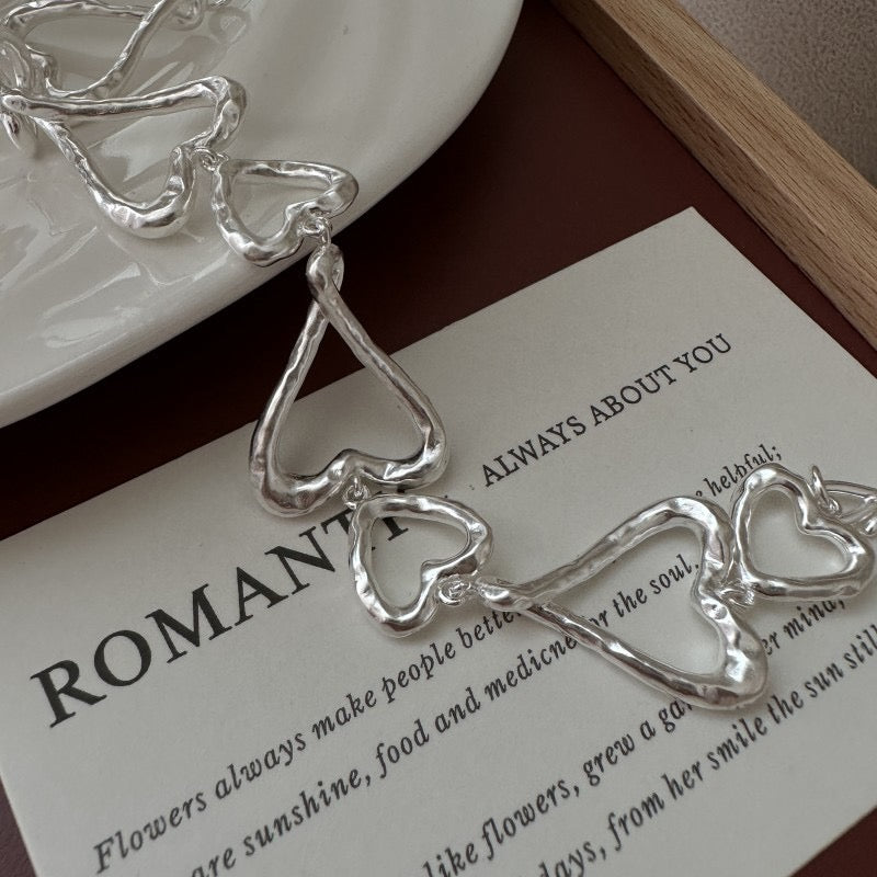 Handmade sterling silver heart bracelet