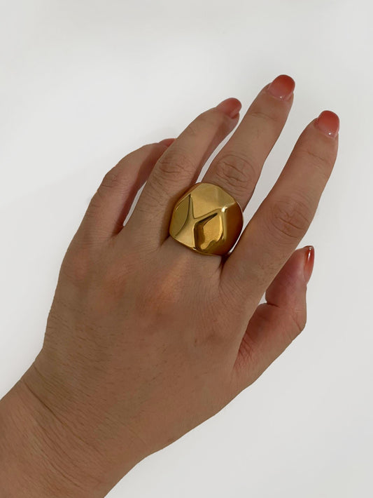 Golden globe statement ring