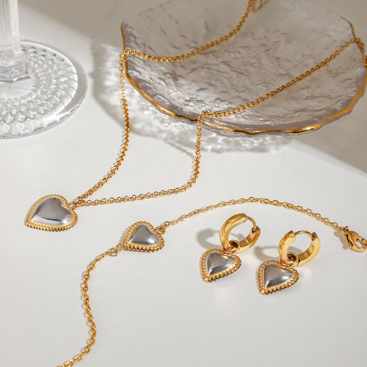 Two tones heart earrings