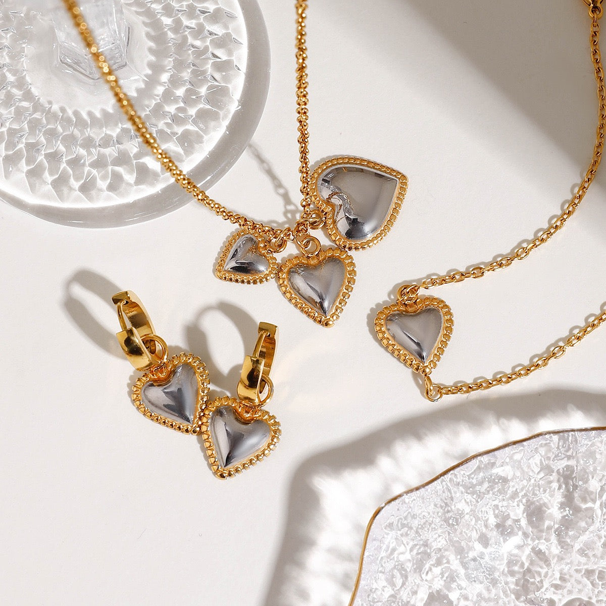 Two tones heart earrings