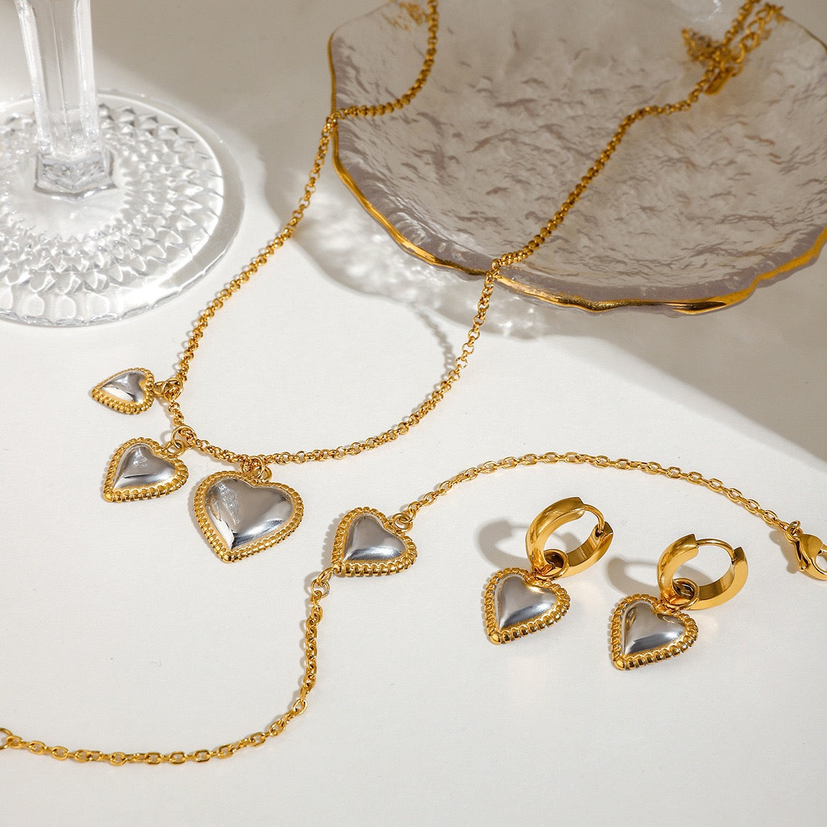 Two tones heart earrings