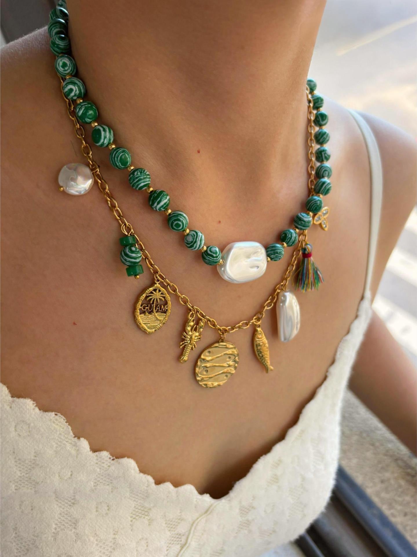 Green fish charm necklace