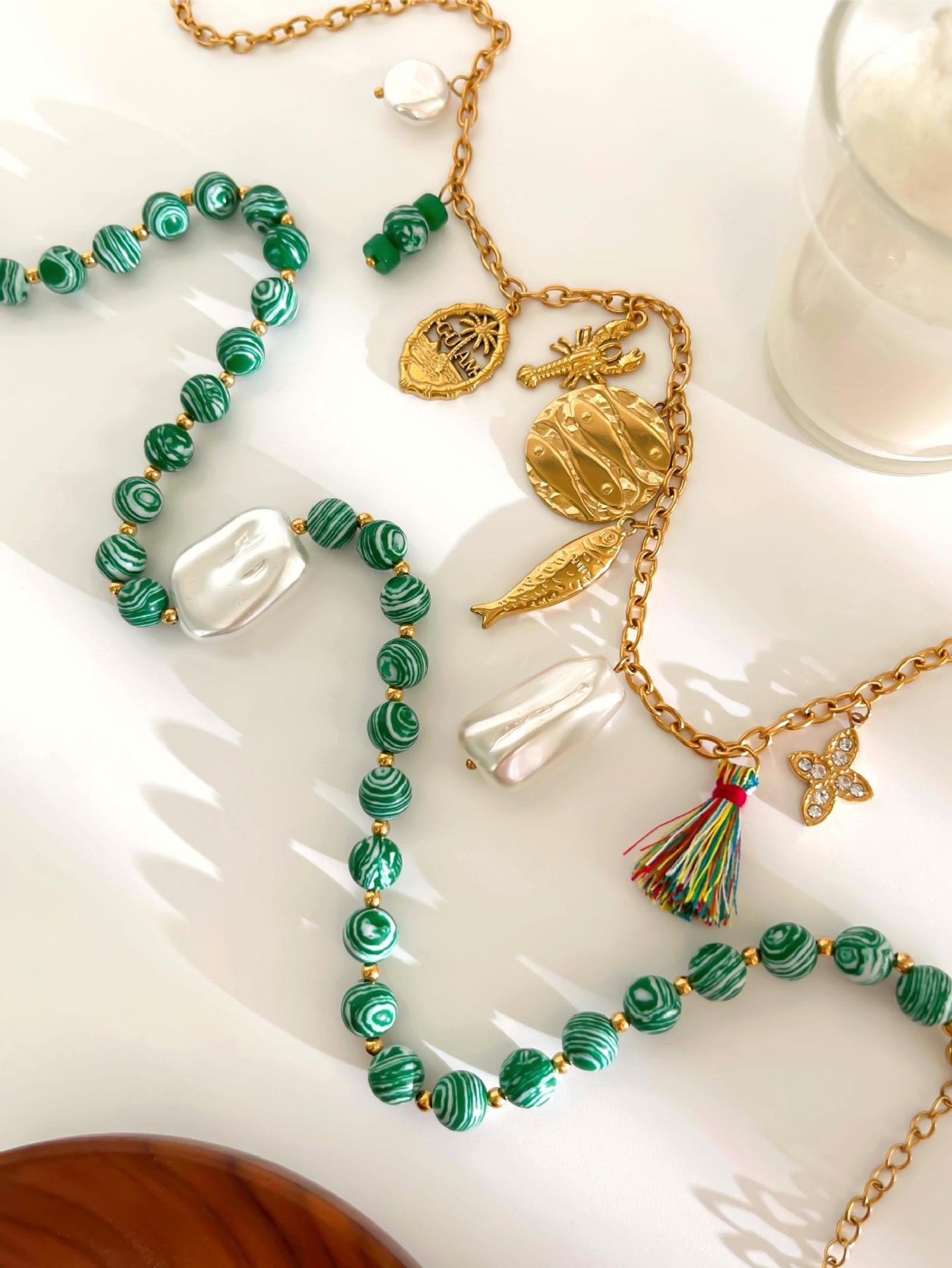 Green fish charm necklace