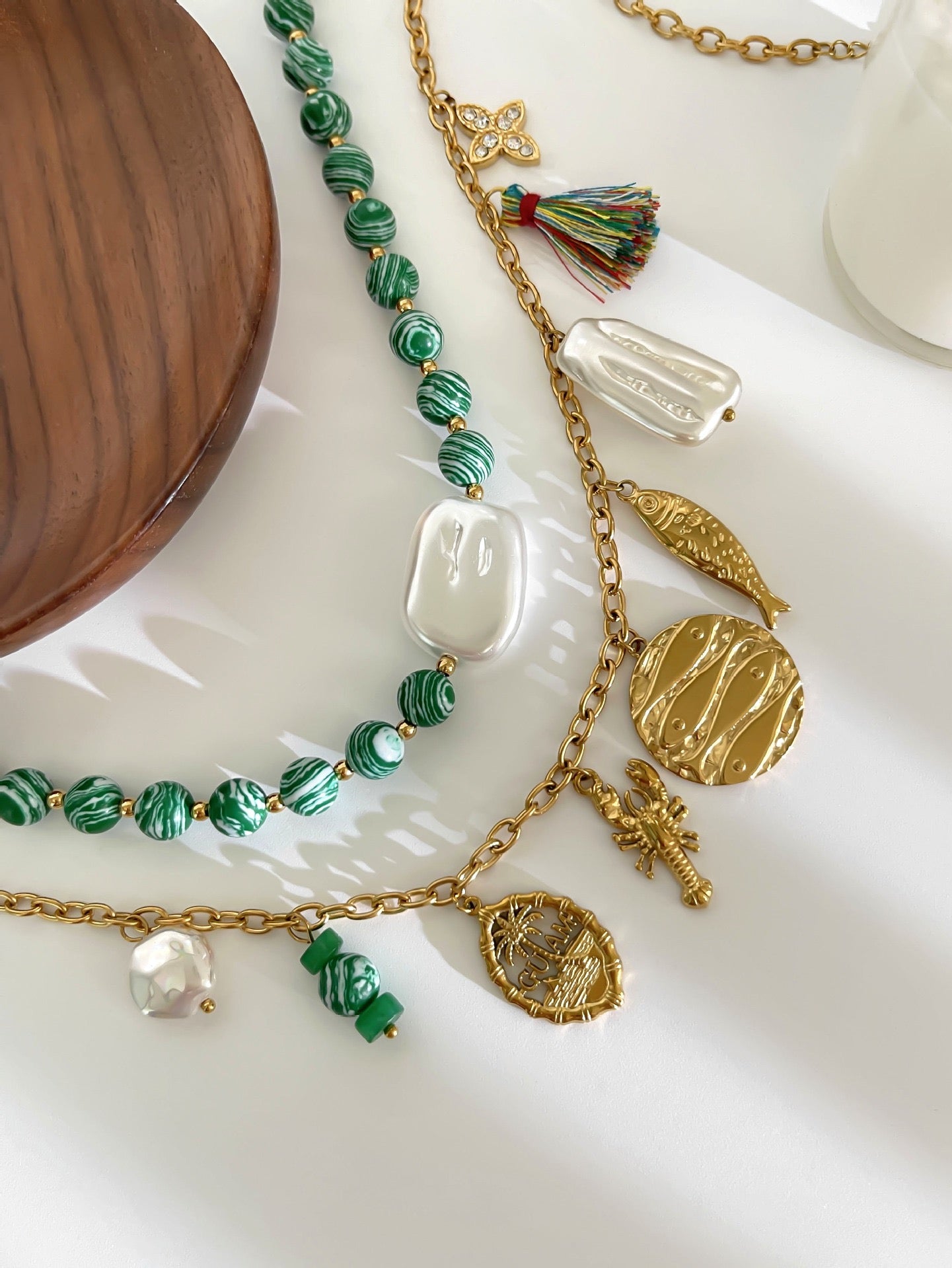 Green fish charm necklace