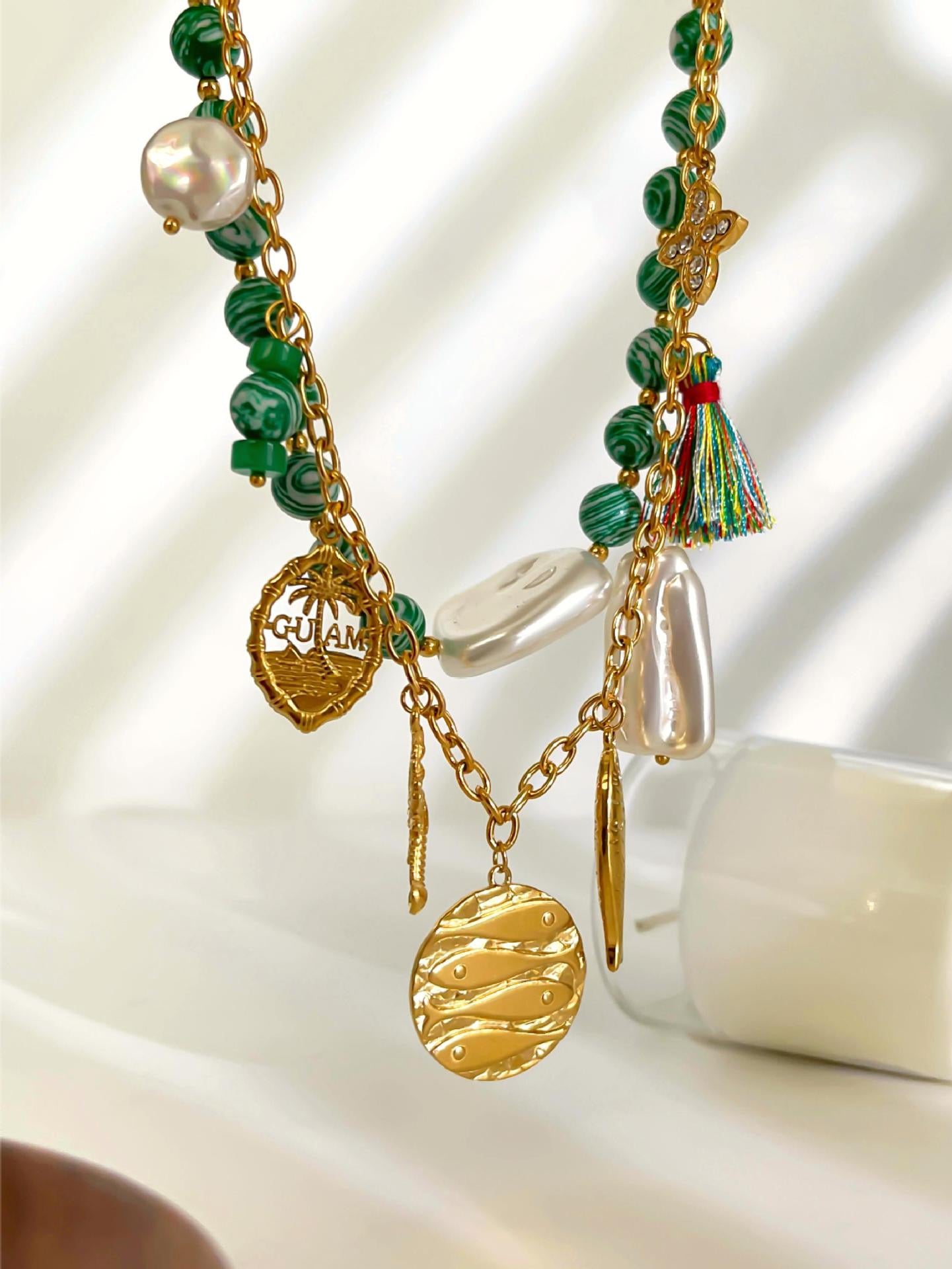 Green fish charm necklace